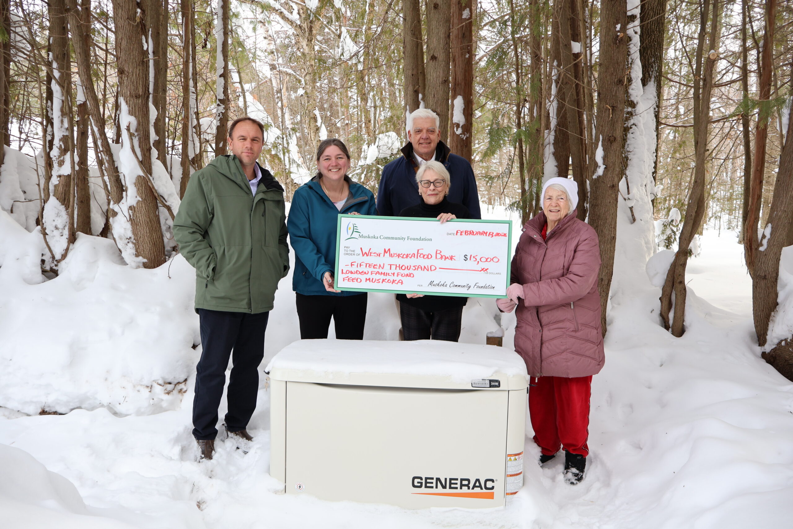 Left to right: David Pink (CAO, Township of Muskoka Lakes), Rebecca Cunnington (Manager West Muskoka Food Bank), Peter Kelley (Mayor of the Township of Muskoka Lakes), Mary Ellen McIntyre (Executive Director of the Muskoka Community Foundation), and Glad Bryce (volunteer and Director of West Muskoka Food Bank) stand outside with the newly installed Generac generator.